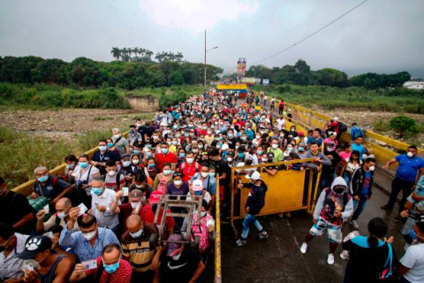 People coming from Venezuela with protective face masks 